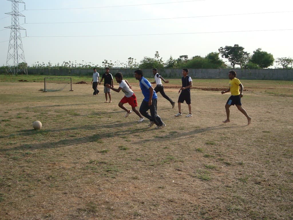 Students on the football ground at BIHE